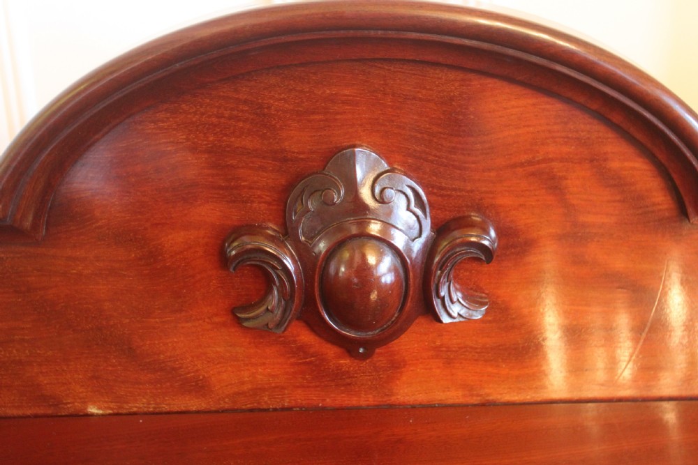 Victorian mahogany buffet sideboard featuring a raised upper tier supported by turned columns above a three-door cupboard base. View VIII