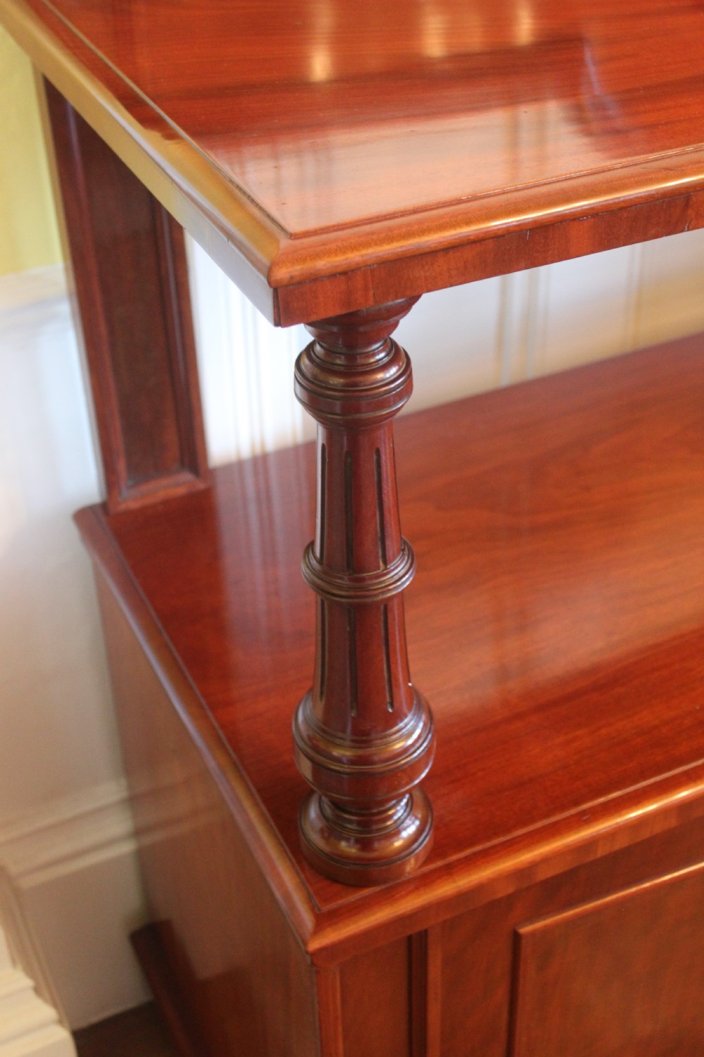Victorian mahogany buffet sideboard featuring a raised upper tier supported by turned columns above a three-door cupboard base. View XI