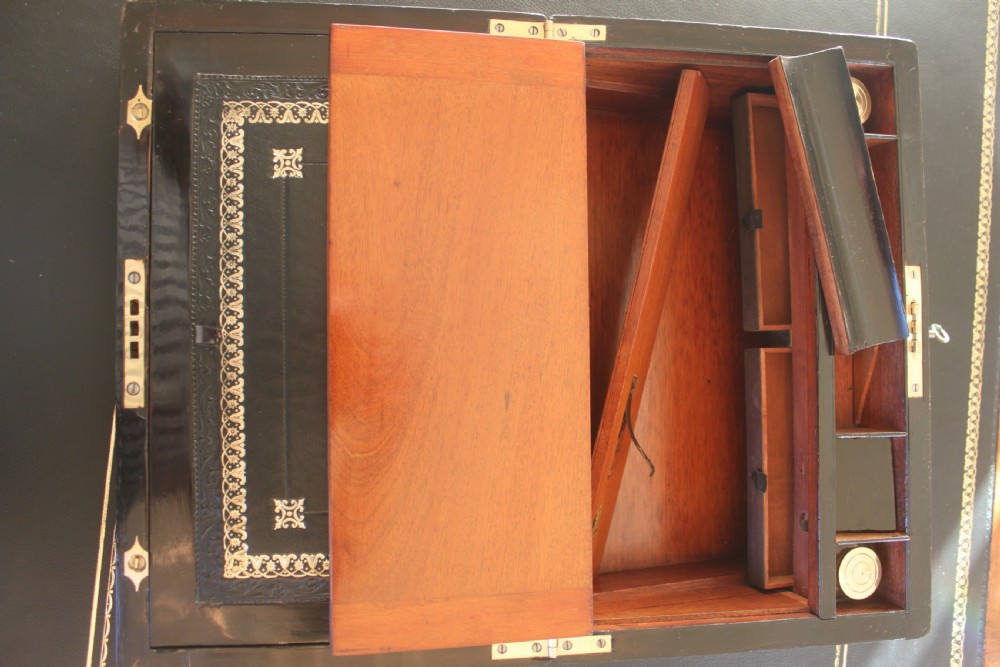 Victorian walnut writing slope with secret drawers View IX