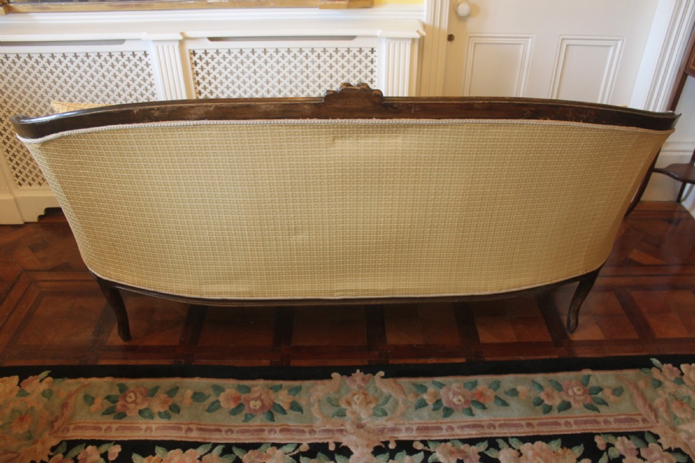 A Victorian walnut Louis XVI style three seater sofa  View V