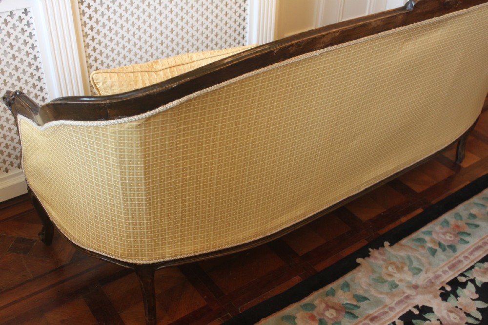 A Victorian walnut Louis XVI style three seater sofa  View VI