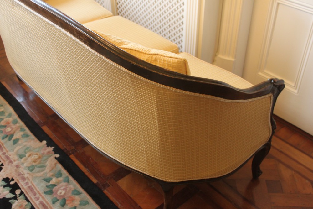 A Victorian walnut Louis XVI style three seater sofa  View VII