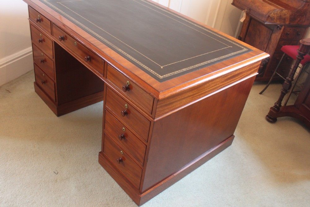 A fine mahogany partners desk by Miles & Edwards View II