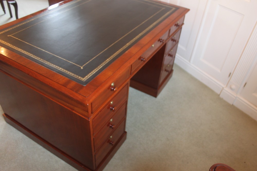 A fine mahogany partners desk by Miles & Edwards View III