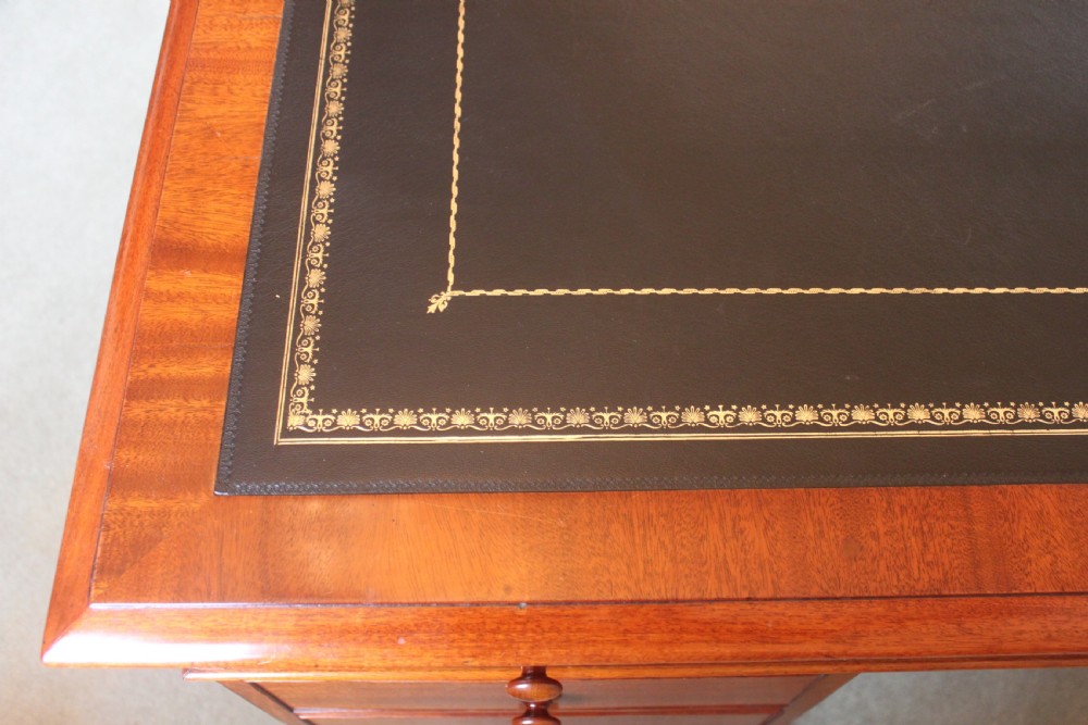 A fine mahogany partners desk by Miles & Edwards View VI