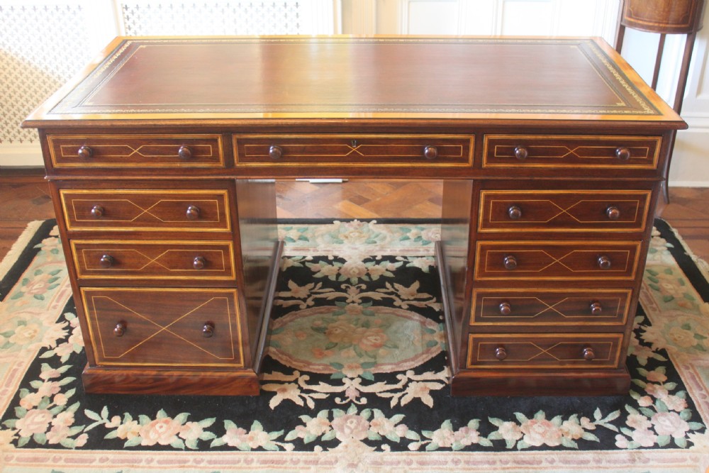 Mahogany inlaid Sheraton style pedestal desk
