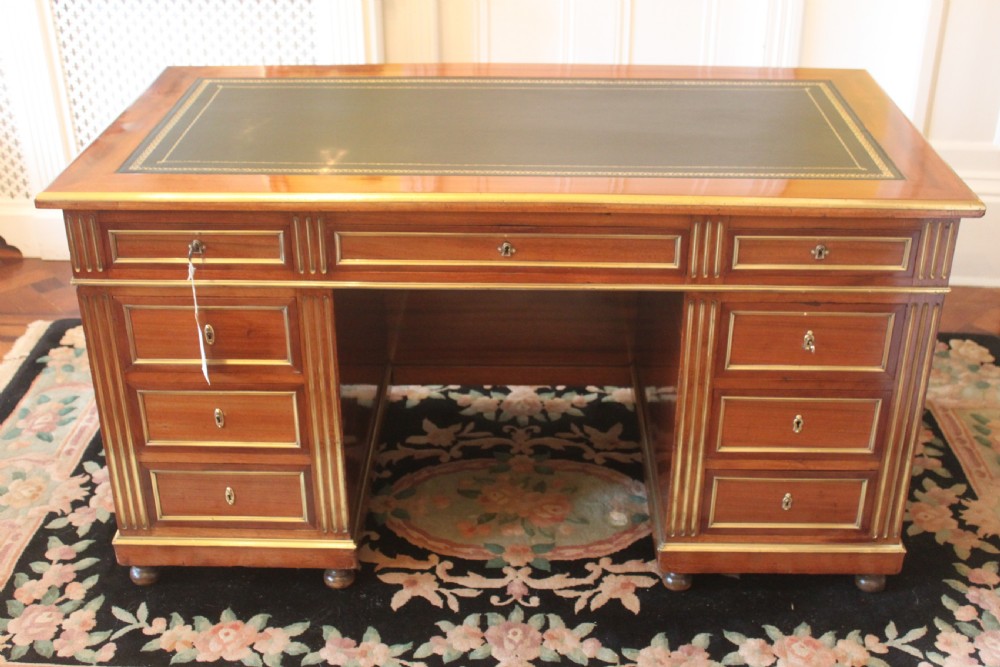 A 19th Century French mahogany and brass inlaid pedestal desk View II