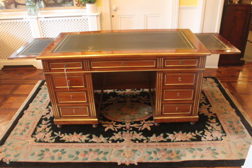 A 19th Century French mahogany and brass inlaid pedestal desk View III
