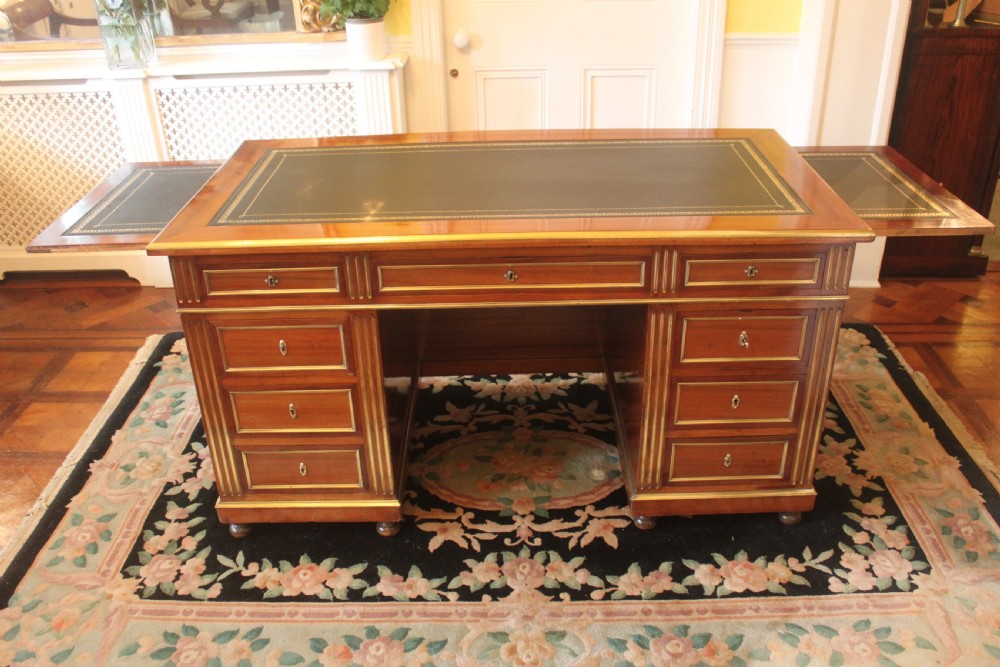 A 19th Century French mahogany and brass inlaid pedestal desk View IV