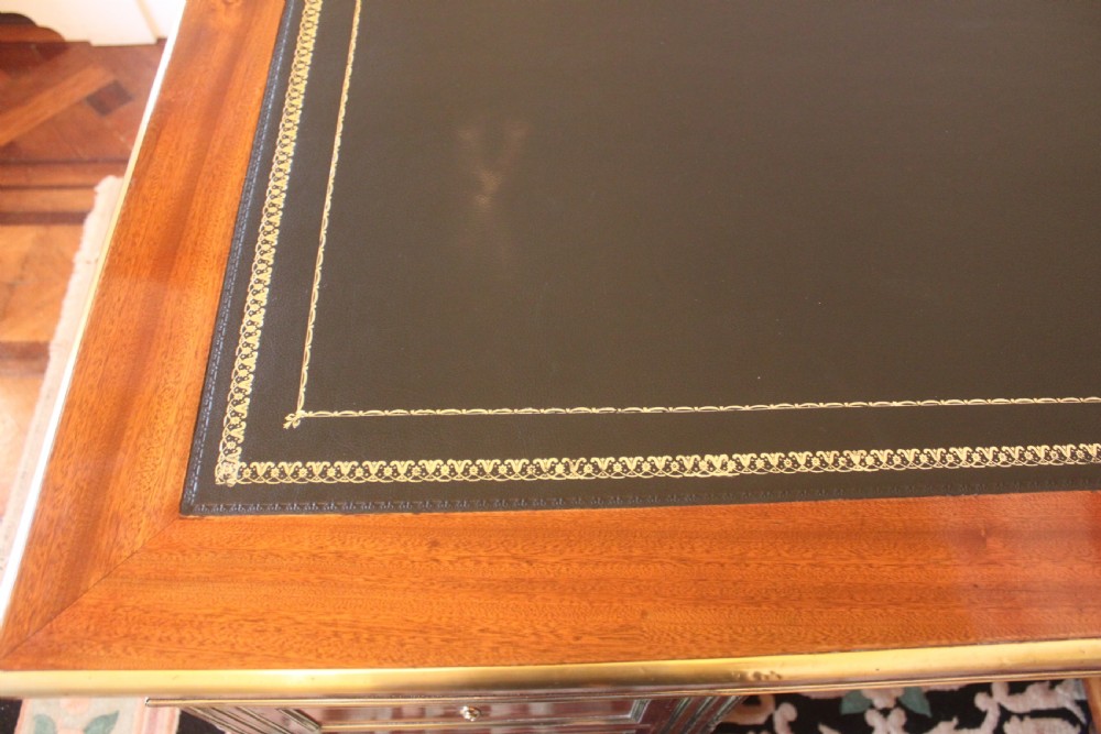 A 19th Century French mahogany and brass inlaid pedestal desk View V