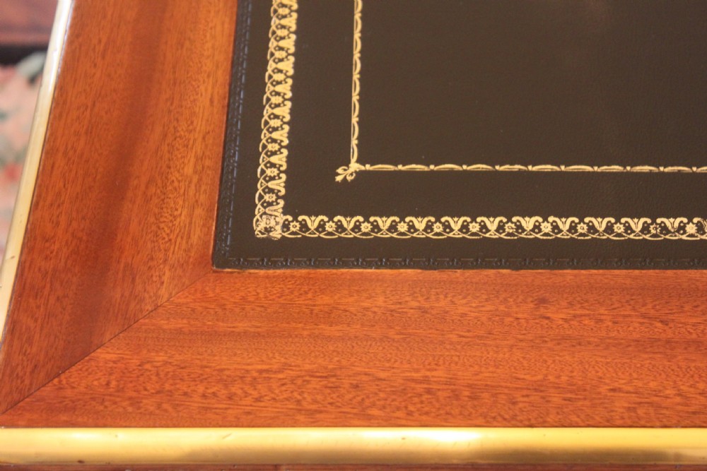 A 19th Century French mahogany and brass inlaid pedestal desk View VI
