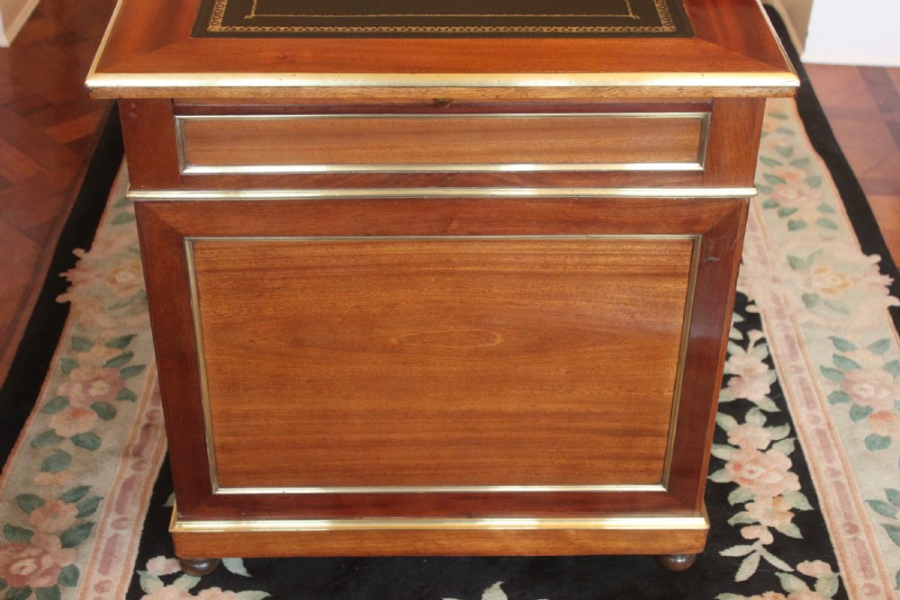 A 19th Century French mahogany and brass inlaid pedestal desk View VIII