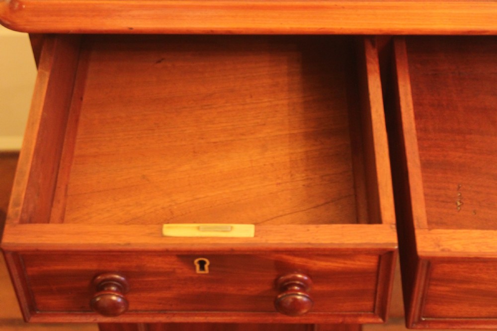 An unusal Victorian mahogany pedestal desk View VIII