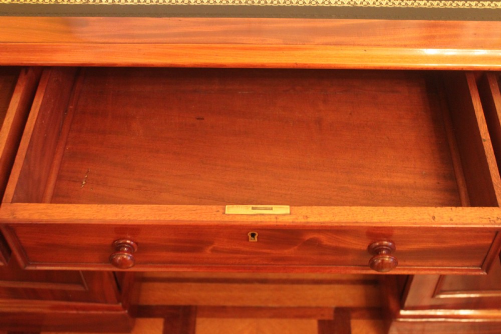 An unusal Victorian mahogany pedestal desk View IX