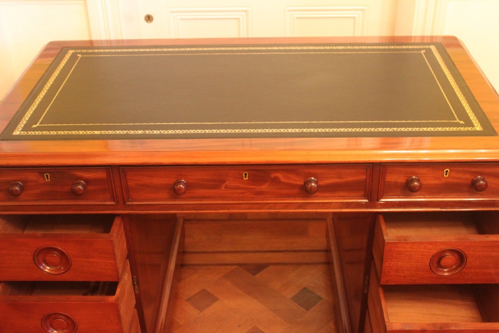 An unusal Victorian mahogany pedestal desk View XVII