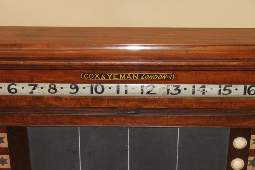 An antique mahogany snooker and life pool scoreboard featuring rolling number dials, colour name plaques, and a central slate panel. View III