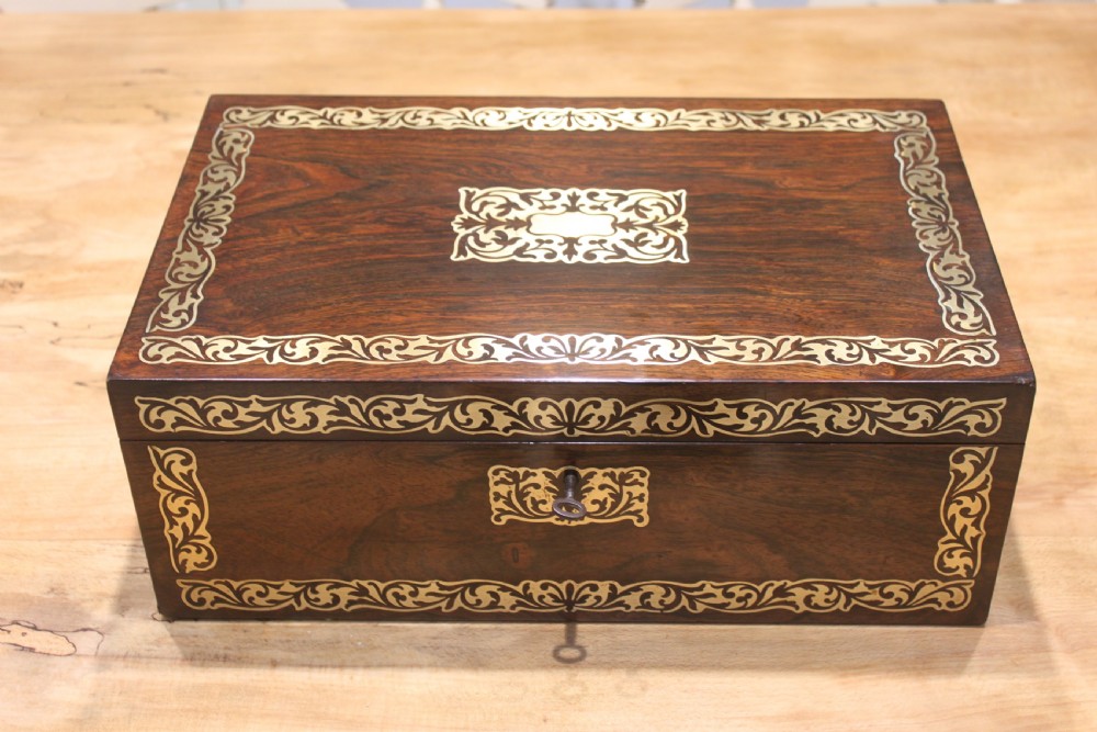 Rosewood and brass inlaid Regency writing slope