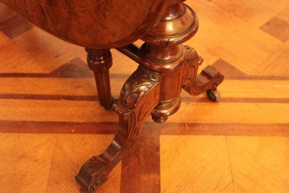 A Victorian burr walnut and inlaid Sutherland table View III