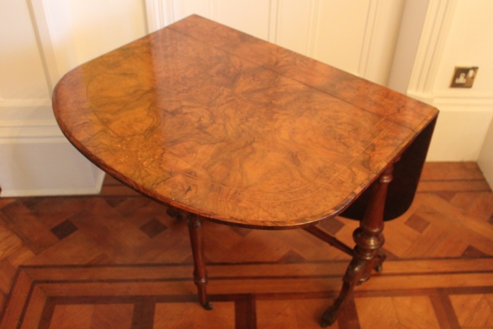 A Victorian burr walnut and inlaid Sutherland table View VI