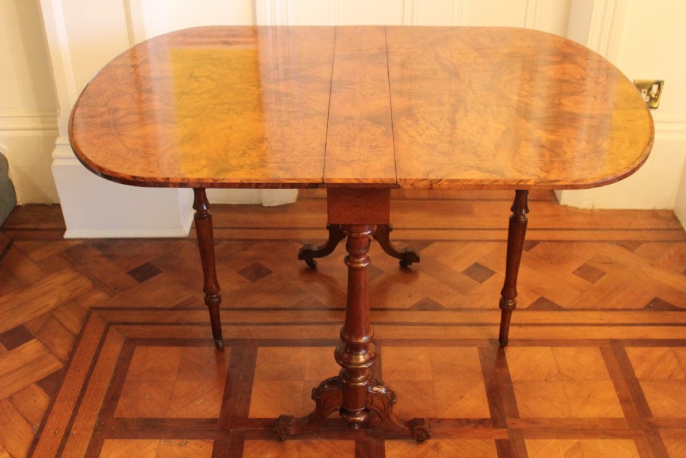 A Victorian burr walnut and inlaid Sutherland table View VII