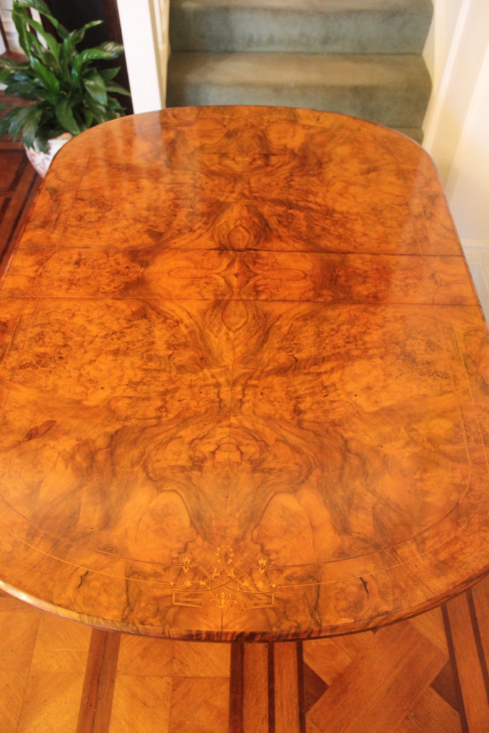 A Victorian burr walnut and inlaid Sutherland table View X