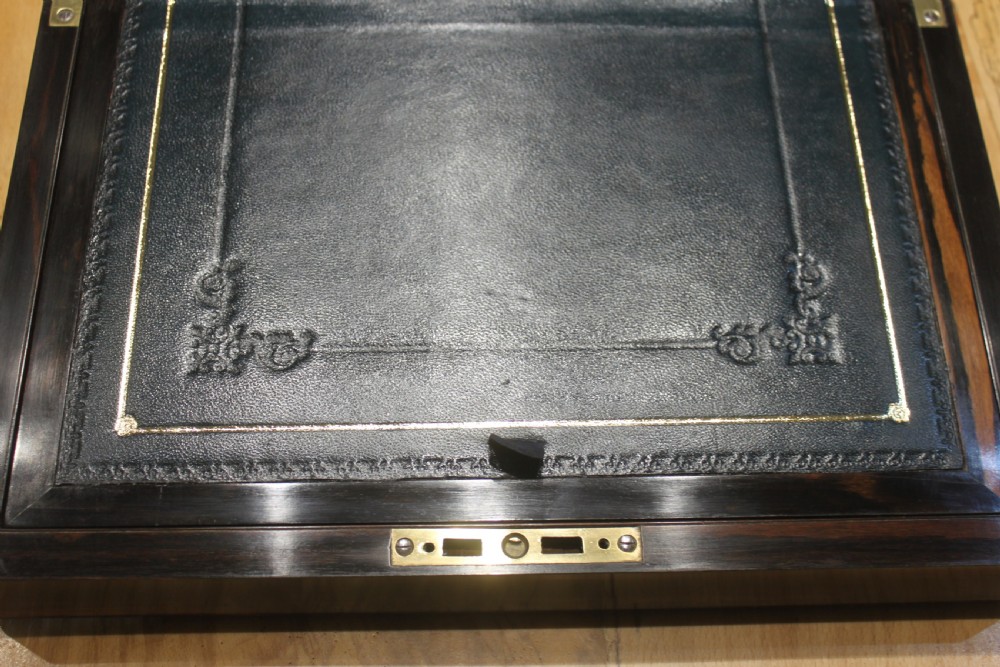 A fine 19th century Coromandel writing slope View IX