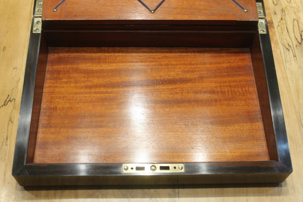 A fine 19th century Coromandel writing slope View XII