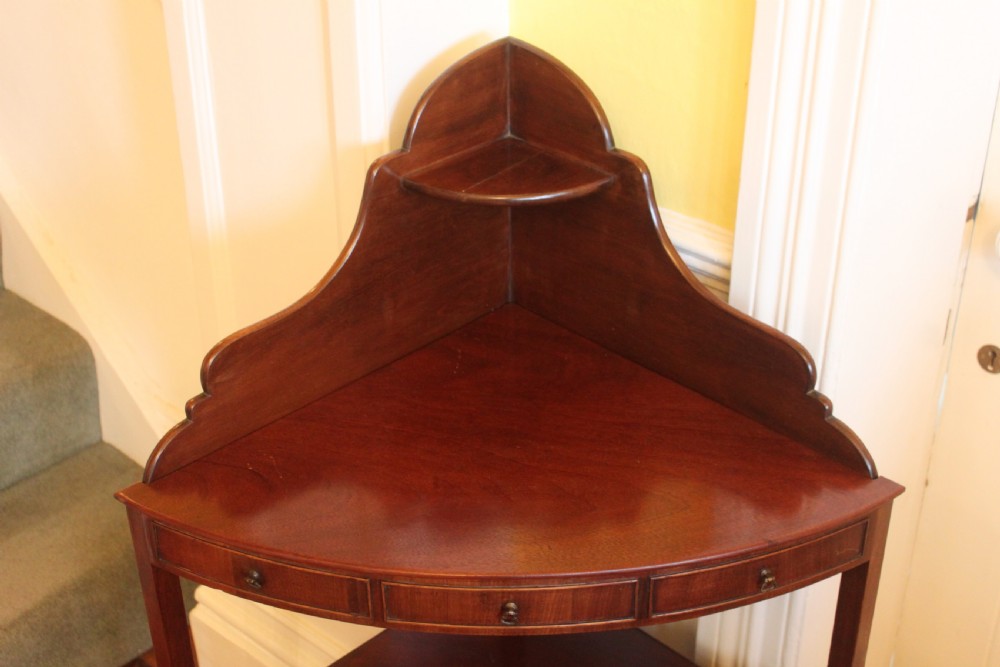 A George III period two tier mahogany  corner wash stand View V
