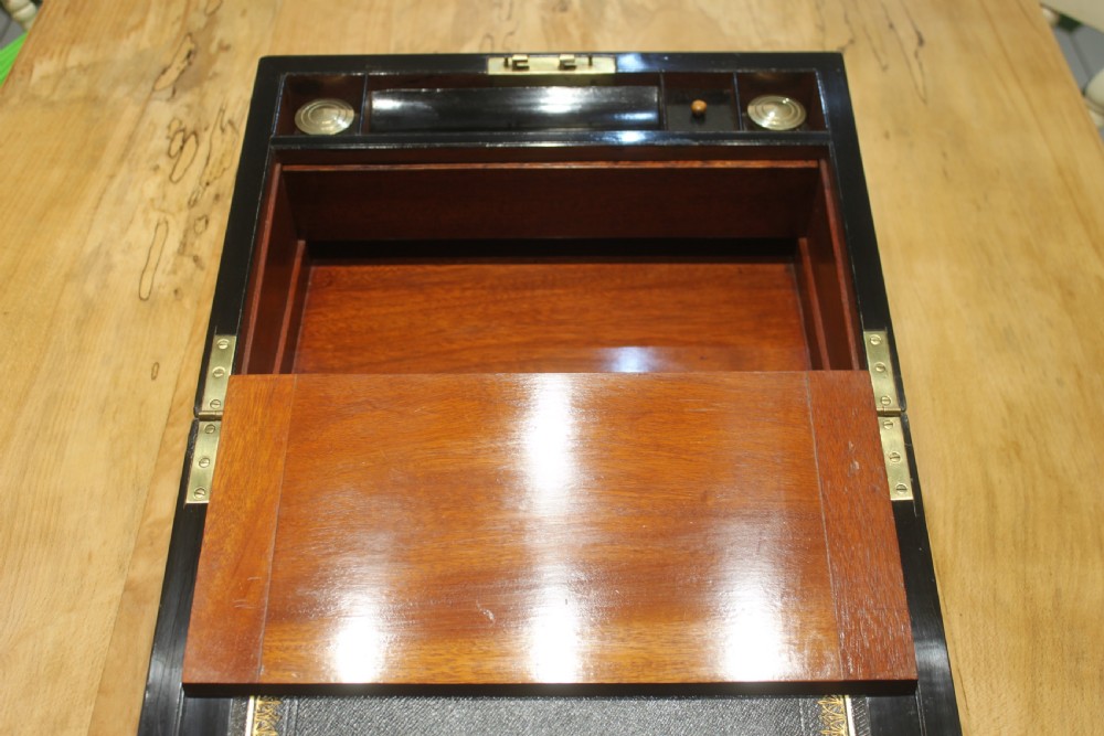 A Victorian burr walnut writing slope with secret drawers & Bramah lock View IX