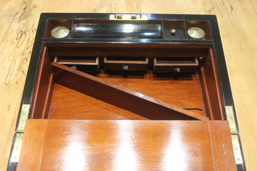 A Victorian burr walnut writing slope with secret drawers & Bramah lock View X