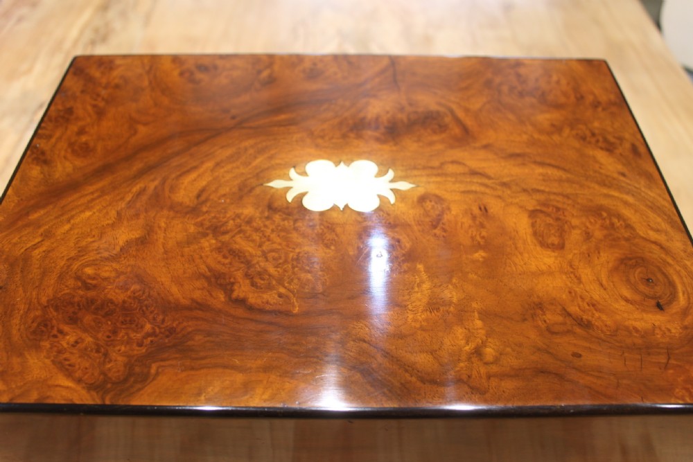 A Victorian burr walnut writing slope with secret drawers & Bramah lock View XI