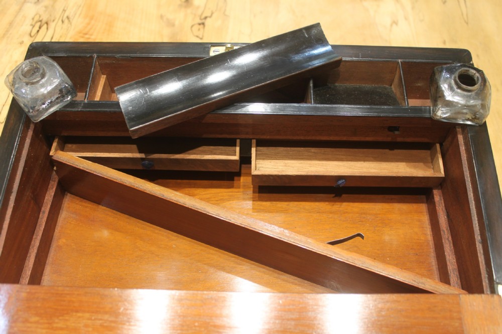 A Victorian burr walnut writing slope View XI