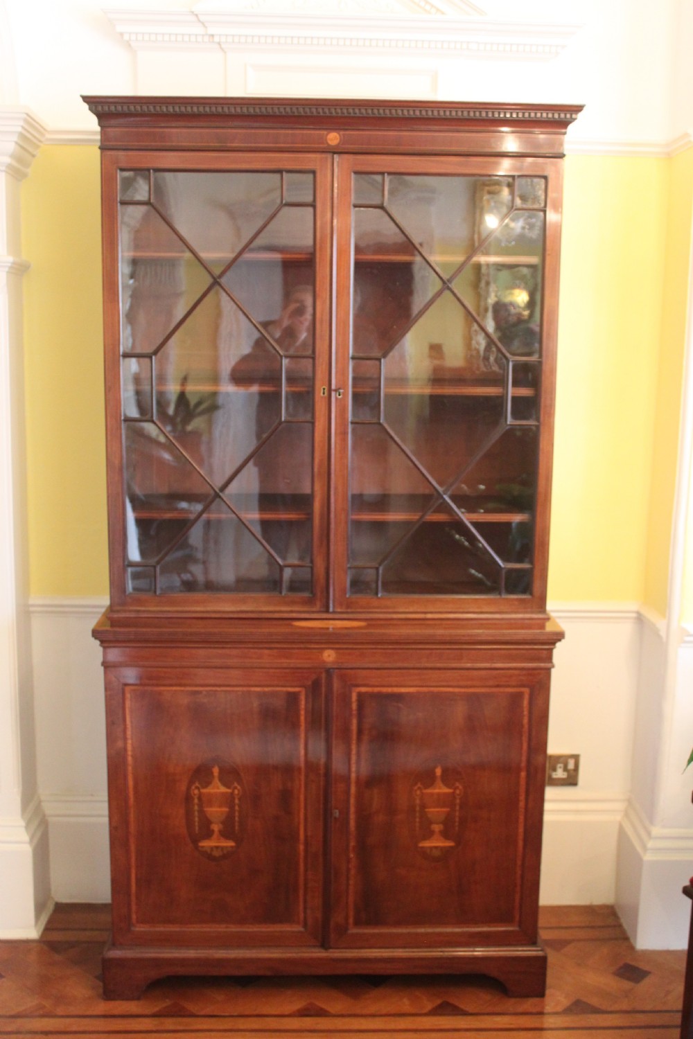 A late 19th Century inlaid mahogany Sheraton Revival library bookcase View III