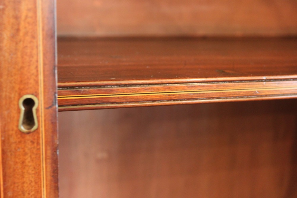 A late 19th Century inlaid mahogany Sheraton Revival library bookcase View X