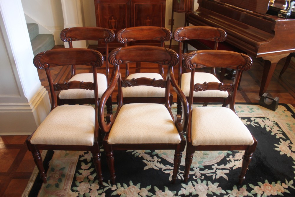 Set of six William IV mahogany dining chairs with one armchair View V