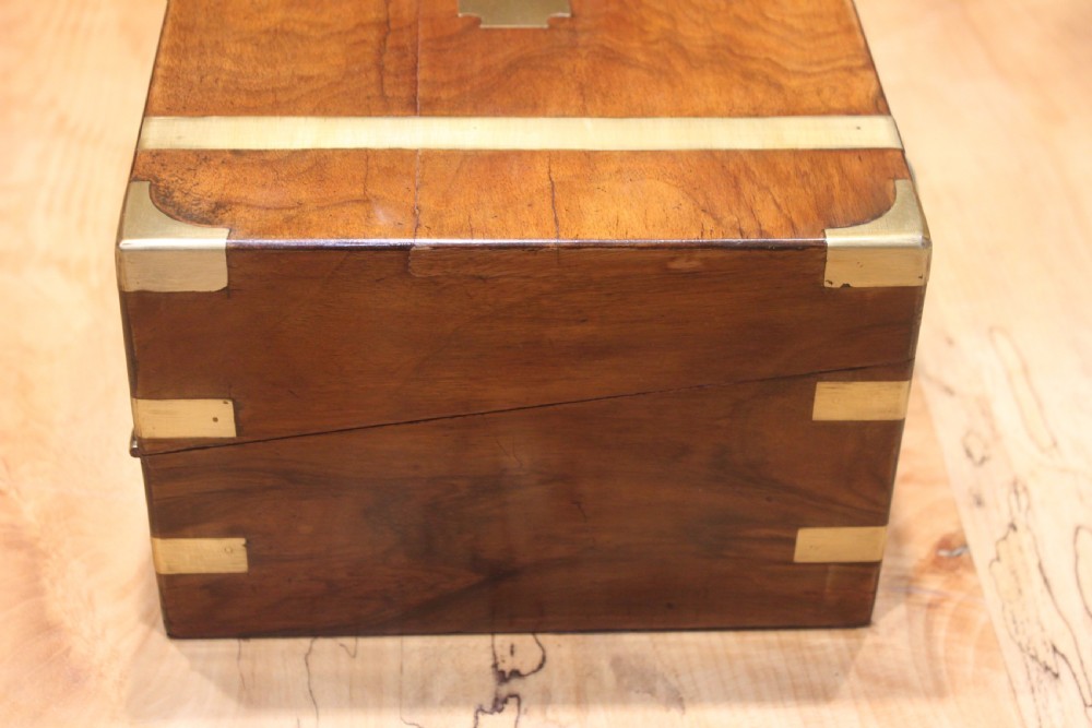 A small Victorian walnut writing slope with secret drawers View III