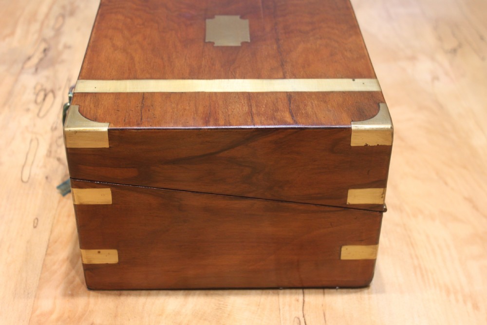 A small Victorian walnut writing slope with secret drawers View V