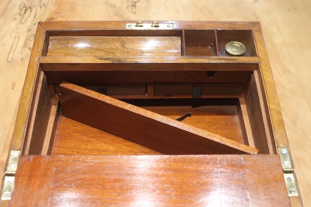 A small Victorian walnut writing slope with secret drawers View IX