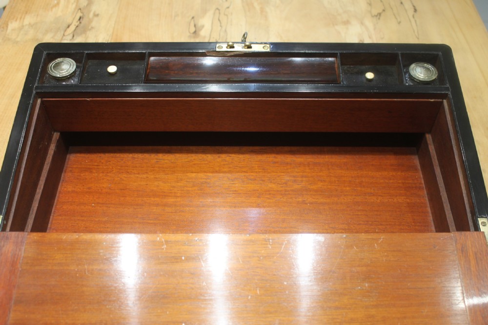 A large 19th century rosewood writing slope with brass inlay View IX