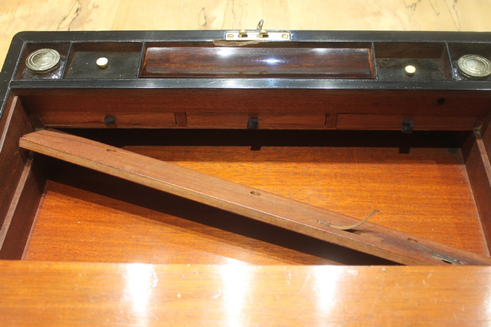 A large 19th century rosewood writing slope with brass inlay View XI