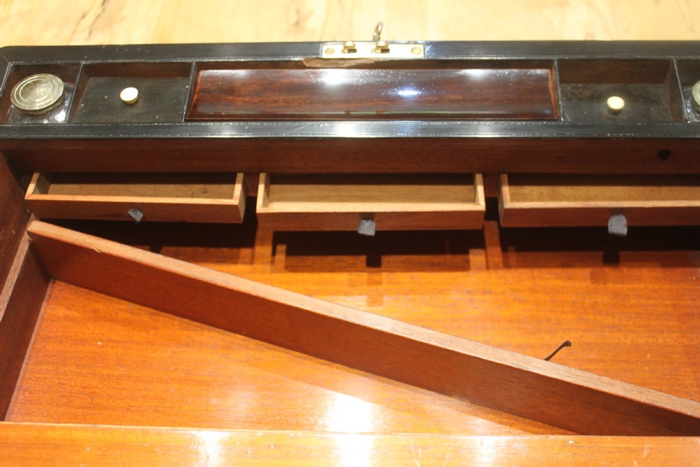 A large 19th century rosewood writing slope with brass inlay View XII
