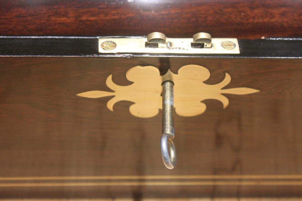 A large 19th century rosewood writing slope with brass inlay View XV