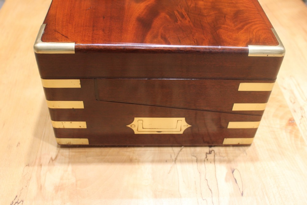 A large and impressive early 19th century mahogany campaign writing slope View IV