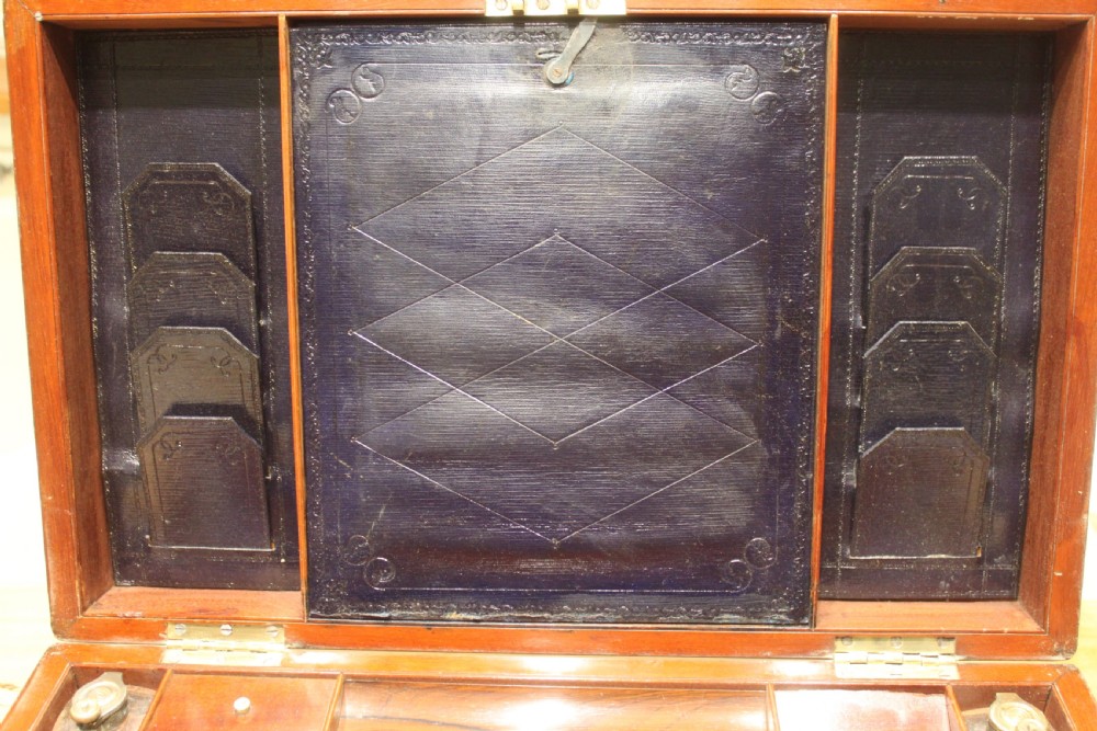 A large and impressive early 19th century mahogany campaign writing slope View VII