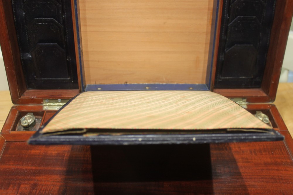 A large and impressive early 19th century mahogany campaign writing slope View IX