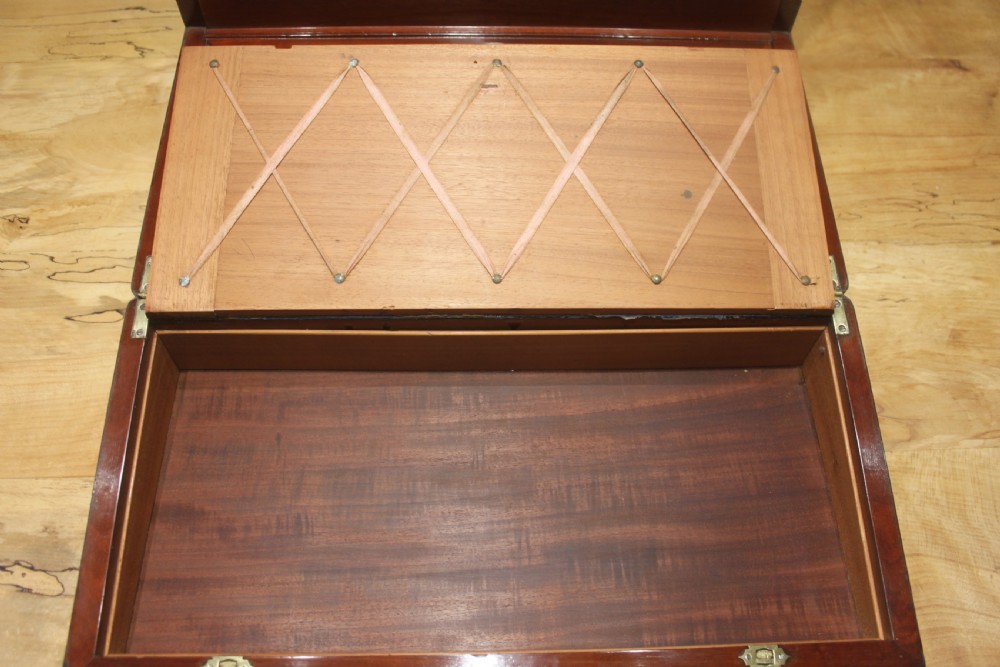 A large and impressive early 19th century mahogany campaign writing slope View XII