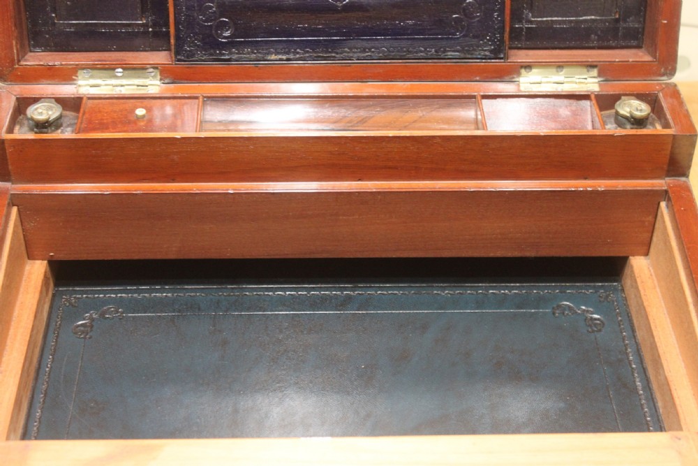 A large and impressive early 19th century mahogany campaign writing slope View XV