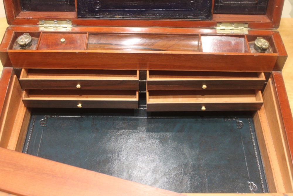 A large and impressive early 19th century mahogany campaign writing slope View XVII