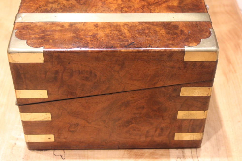 A quality walnut writing slope with stationery compartments, secret drawers etc. View II