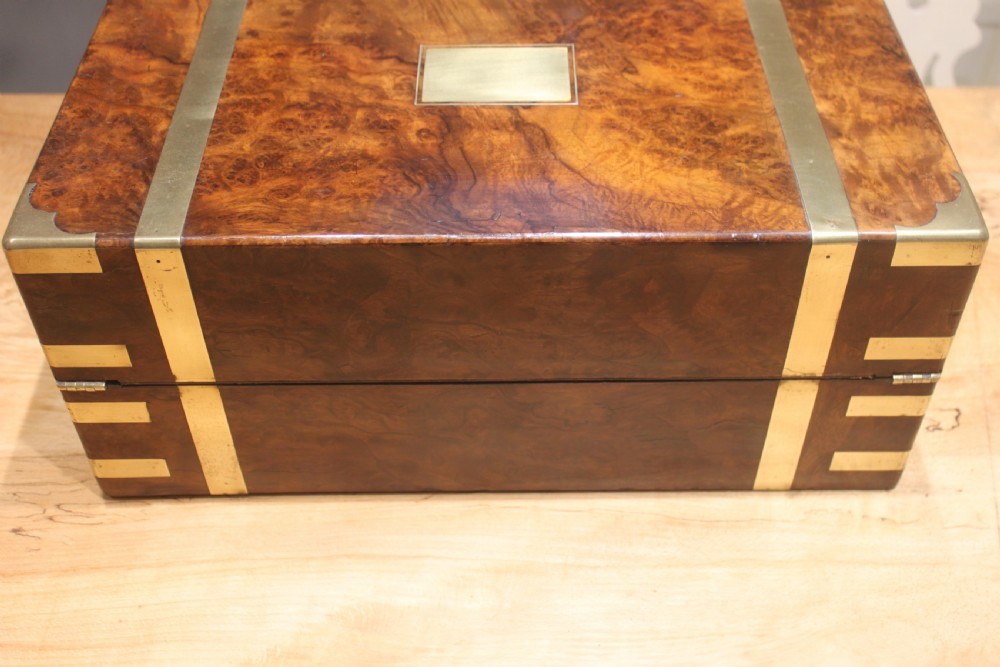 A quality walnut writing slope with stationery compartments, secret drawers etc. View III